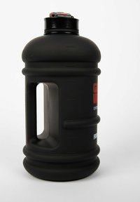 Black plastic water jug with a textured surface, cylindrical shape, integrated handle, and a secure lid featuring a red accent.
