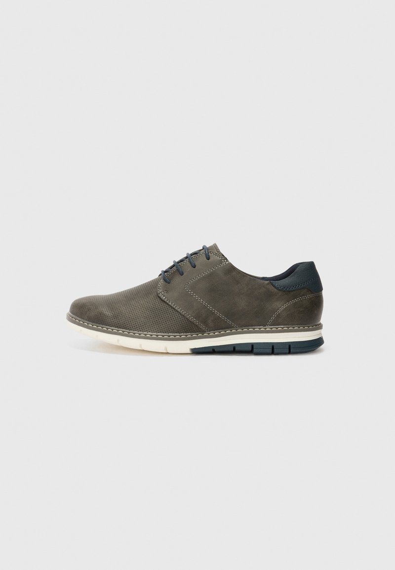 Men's low-top shoes in dark grey suede with perforated detailing, white midsole, and navy accents on the heel and eyelets.