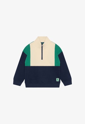 Kleur geblokkeerde trui in crème, marineblauw en groen met een hoge kraag, halve ritssluiting aan de voorkant en een textuurafwerking. Bevat een logopatch.