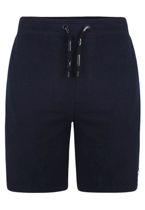 Marineblå shorts med en ribbet tekstur, der har en elastisk talje, justerbar snor og en logoaccent i siden.