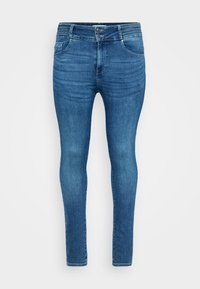 Jeans skinny em denim azul médio, com uma cintura alta, dois bolsos frontais e ligeiramente desbotados para adicionar textura.