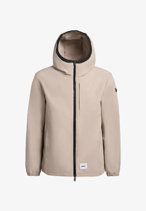 Veste beige avec un col montant et une capuche, fermeture éclair à l'avant et poignets élastiques. Accents noirs le long de la capuche et de la fermeture éclair. Design simple.
