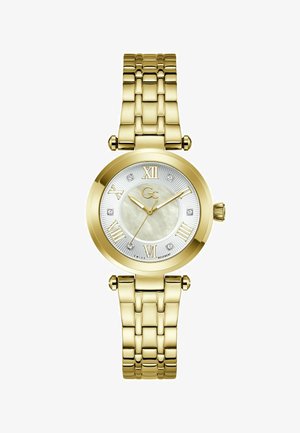 Kullavärvi käekell pärlmutterkettaga, rooma numbrite, teemantmärkide ning lingitud käevõruga, kell näitab aega 10:10:36.