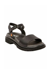 Sandalia negra con una correa frontal ancha, correa ajustable en el tobillo y suela texturizada. Presenta un logotipo y un acento naranja en el lateral.