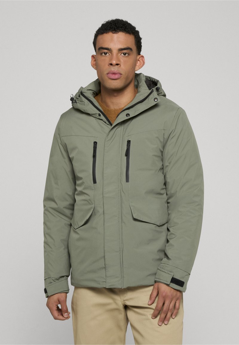 Light green insulated jacket with a hood, front zipper, and two zippered chest pockets. Features elastic cuffs and Velcro accents.