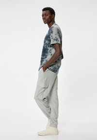 Koton JOGGER  - Reisitaskuhousut - grey