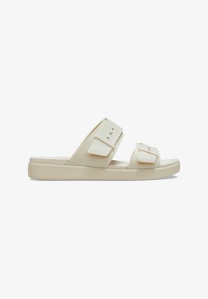 Beige rubber sandals with two wide straps, adjustable hardware, and a cushioned platform sole. Smooth texture and minimal design details.