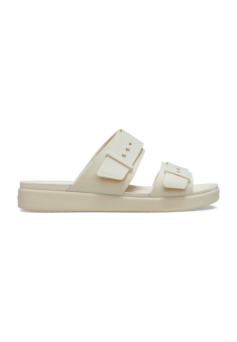 Beige rubber sandals with two wide straps, adjustable hardware, and a cushioned platform sole. Smooth texture and minimal design details.