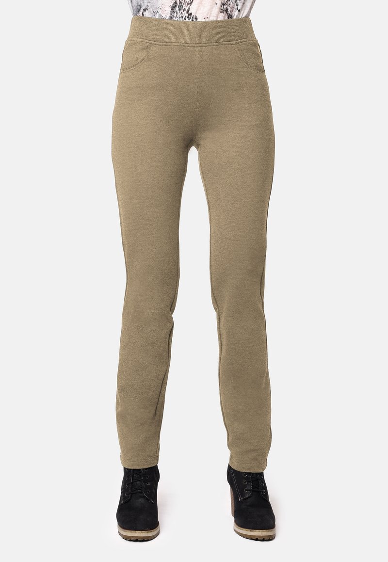 Pantalones stretch color caqui con un diseño ajustado, que cuentan con una amplia cinturilla elástica y bolsillos laterales, hechos de una suave tela con textura.