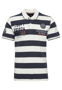Camiseta polo a rayas azul marino y blanca, hecha de algodón. Presenta un cuello, tapeta de botones de dos y logotipos y texto bordados en la parte delantera.