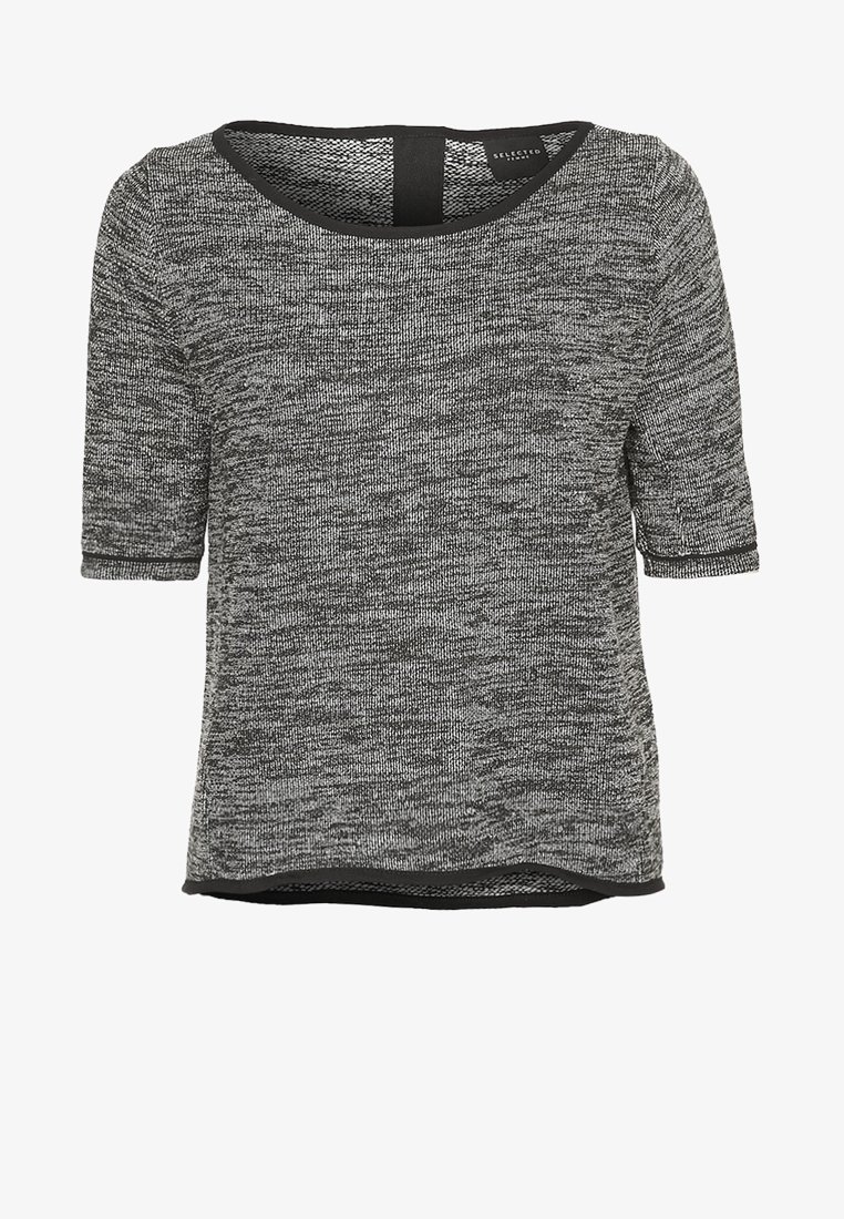 Haut gris et noir en maille à manches courtes, avec encolure arrondie et bordure noire aux manches et à l'ourlet.