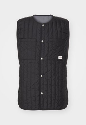 Must have mustruudiga must vest ümmarguse kaelusega, ees nupud ja kaks välist taskut. Kangas näeb välja tekstuuriga, millel on madal läige.