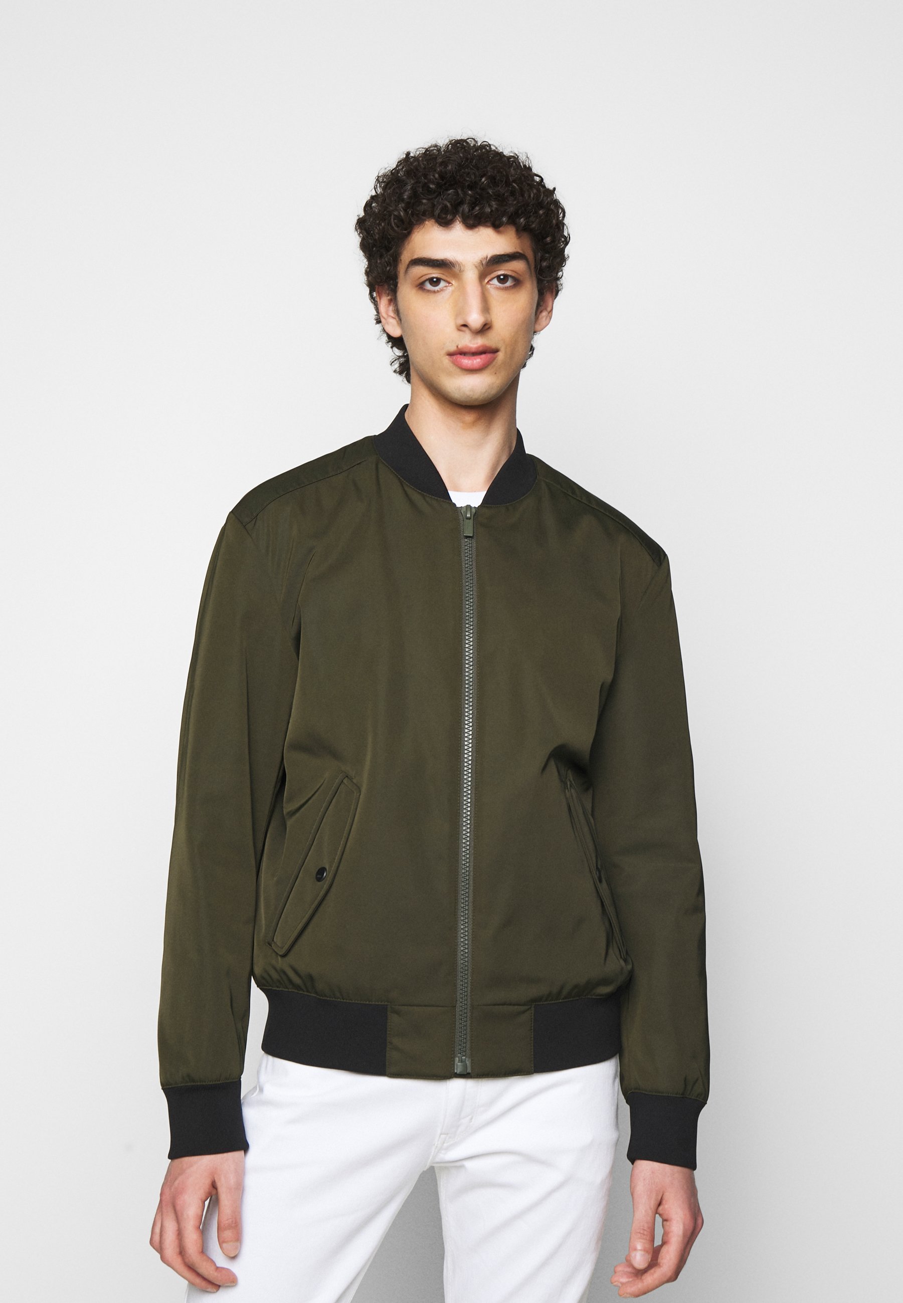 dark green bomber jacket