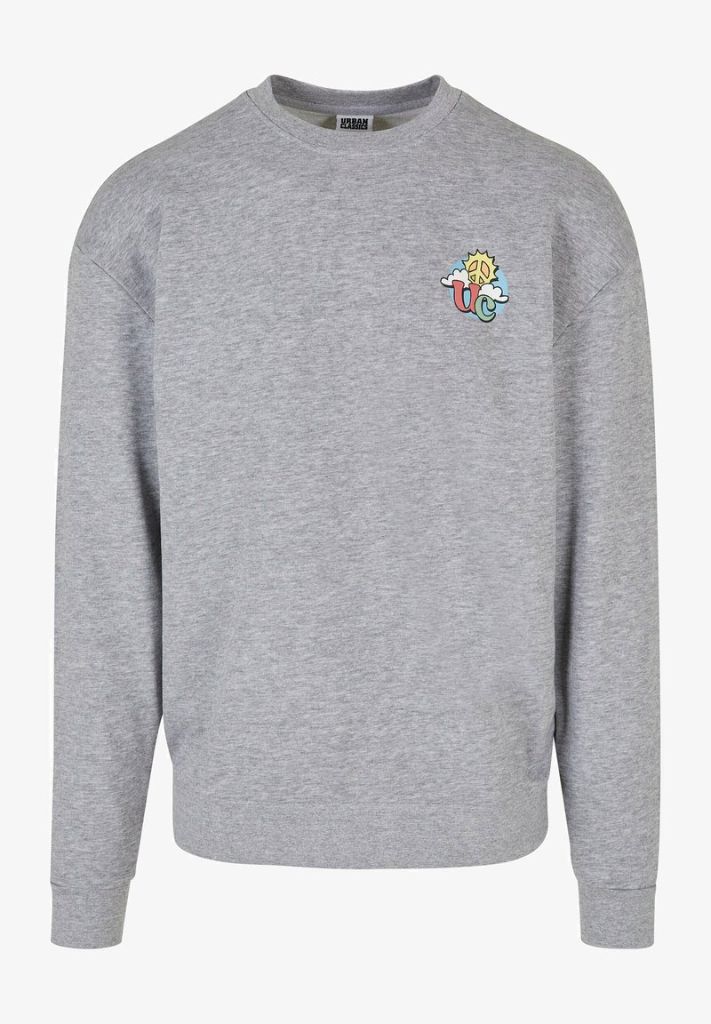 Felpa grigia realizzata in un mix di cotone con scollo a girocollo, polsini a coste e un piccolo logo grafico colorato sul petto.