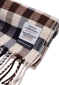 Sciarpa in lana con un motivo a quadri marrone e crema, con bordi frangiati. Include un'etichetta che indica la resistenza all'acqua e le istruzioni per la cura.