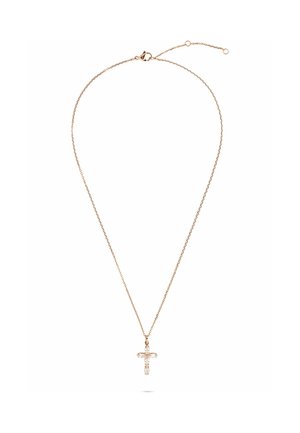Zarte Halskette aus Gold mit kleinem Kreuzanhänger, der klare Edelsteine enthält, auf weißem Hintergrund präsentiert.