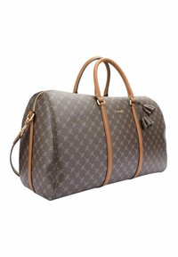 Ruskea kuviollinen duffel-laukku, jossa on vaaleanruskeat nahkaosat, kaksoiskahvat ja irrotettava olkahihna. Varustettu vetoketjulla ja tupsuyksityiskohdalla.