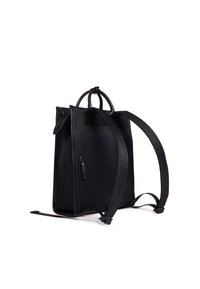 Black leather backpack with double handles, adjustable straps, and a front zip pocket. Smooth texture, structured design, and minimalist style.