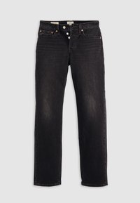Jean noir à jambes droites avec fermeture par boutons, poches avant et arrière, et détails de rivets en cuivre sur fond gris clair uni.