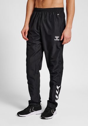 CORE XK  - Tracksuit bottoms - black