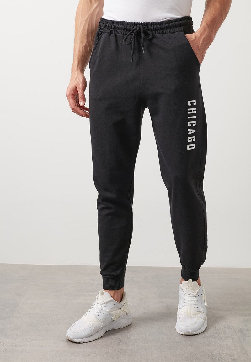 Buratti SLIM FIT Tracksuit bottoms black Zalando.ie