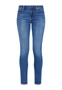 Skinny jeans made of denim, medium blue wash with a faded texture, high waist, and classic front pockets, accented by a metal button.