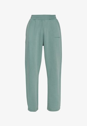 Világoszöld, egyenes szárú tréningnadrág elasztikus derékpánttal és oldalzsebekkel, finom "DROPSIZE" logóval a jobb elülső combon.