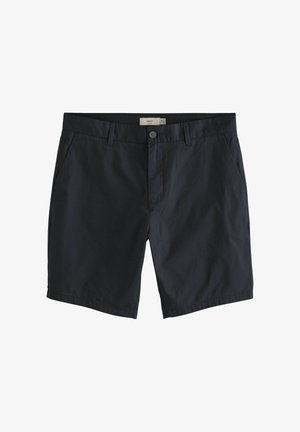 Tumedat sinised lühikesed püksid, mis on valmistatud kergest kangast, millel on kaks külgtaskut, nööpide sulgemine ja vööaugud reguleeritava sobivuse jaoks.