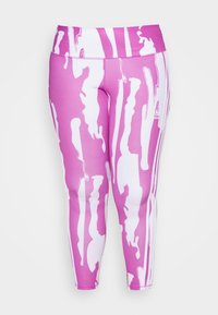 Růžové sportovní legíny s lesklým abstraktním bílým vlnitým vzorem, vysokým pasem a syntetickým materiálem odvádějícím vlhkost. Obsahují šité švy a logo.
