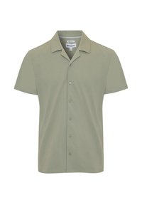 Camisa de manga corta abotonada en verde claro, hecha de material suave, con cuello puntiagudo y seis cierres frontales de botón. Corte regular.