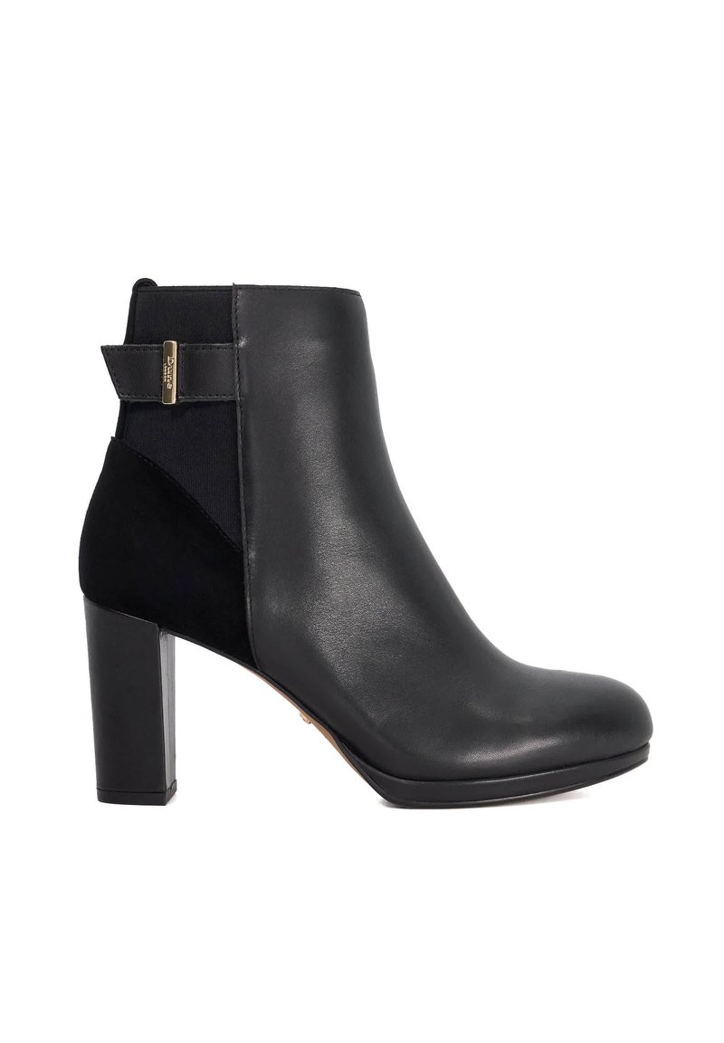 Black leather ankle boot with a block heel, featuring a textured fabric panel and a gold accent on the back for easy pull-on.