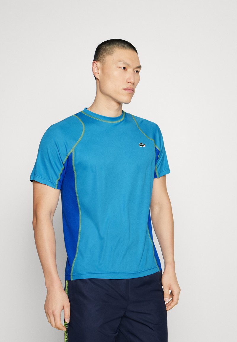 t shirt lacoste sport bleu