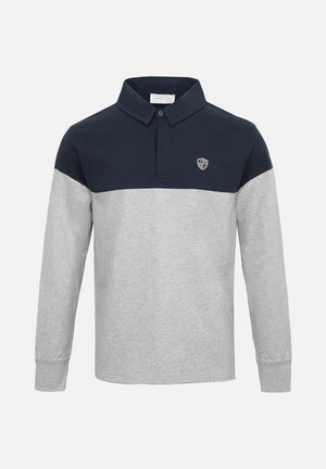 Μπλούζα πόλο με μακριά μανίκια που διαθέτει αντίθετο γιακά σε ναυτικό μπλε και άνω μέρος με γκρι κάτω τμήμα, κατασκευασμένη από απαλό ύφασμα με βαμβακερό μείγμα.