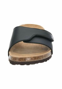 Black slip-on sandal with a single strap, cork footbed, and textured rubber sole. The interior has a soft finish, enhancing comfort.