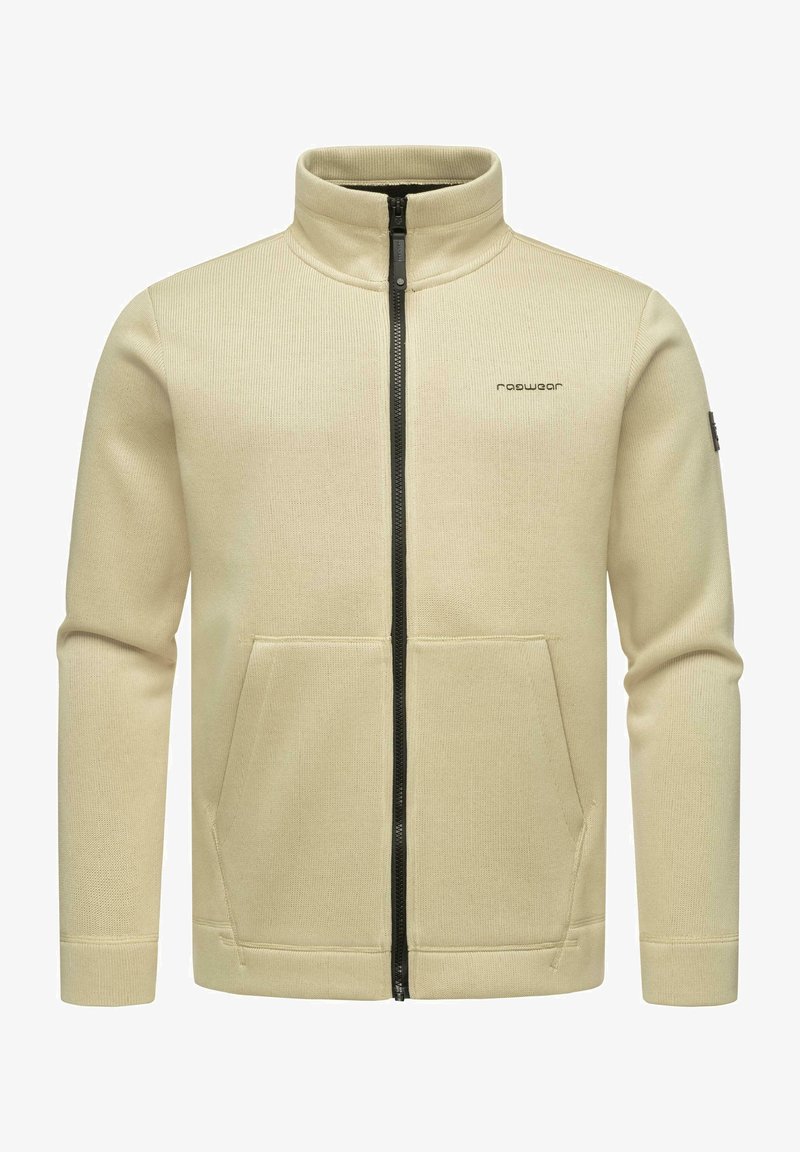 Beige zip-up jacket with a high collar and two front pockets. Textured fabric and black zipper detailing enhance the design.