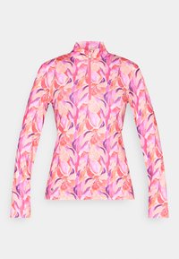 Rokas piedurknēm, ceturtā daļa-zip augšdaļa rozā, oranžā un violetā ziedu rakstā. Izgatavota no teksturēta, elastīga auduma ar augstu apkakli.