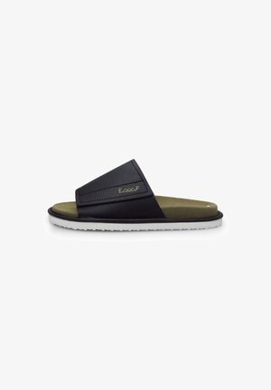 Black slide sandal with a wide upper strap, olive green insole, and white rubber sole. Features embossed brand logo on the strap.