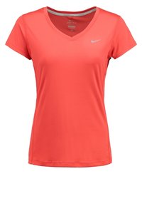 Koralli urheilupaita lyhyillä hihoilla, V-pääntiellä, sileällä pinnalla ja Nike-logolla rinnassa; sisältää hengittävää verkkomateriaalia.