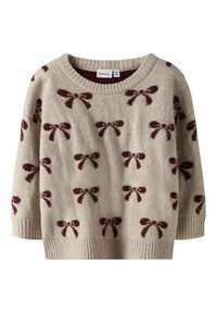 Pull beige avec un col rond, présentant un tissu texturé, des motifs de nœud rouge et des poignets et un ourlet côtelés. Convient pour une tenue décontractée.