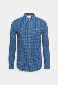 Camicia a maniche lunghe a quadri blu e verde acqua con colletto abbottonato, caratterizzata da un piccolo logo sul petto sinistro e bottoni bianchi.