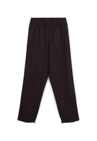 Schwarze, lockere Hose mit elastischem Bund, aus weichem Material und mit rohen Säumen. Enthält zwei Seitentaschen.