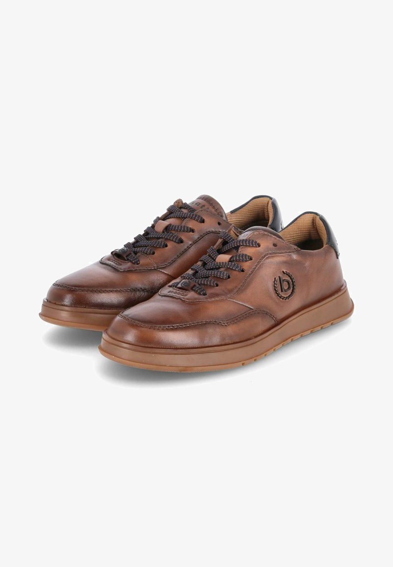 Braune Ledersneaker mit schwarzen Schnürsenkeln, runder Zehenpartie und strukturiertem Gummisohle. Mit Logodetail an der Seite und einem flachen Design.
