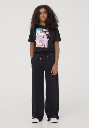 LEGGERI WIDE LEG - Pantaloni sportivi - nero