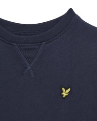 Felpa a maniche lunghe blu navy con scollatura a V cucita e un piccolo logo di un uccellino giallo sul petto; materiale in cotone.