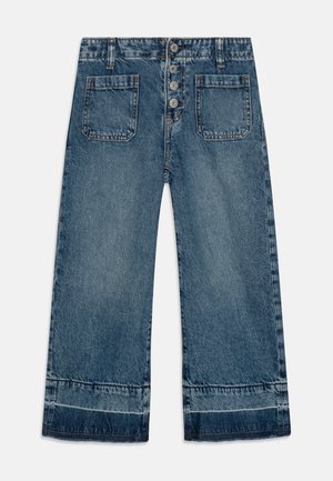 Blue denim wide-leg trousers featuring a high waist, five-button front closure, and two patch pockets with a frayed hem detail.