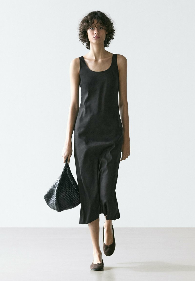 halter dress swimsuit Dolfin Women's Aquashape Solid Wrap Halter Swim Dress - Black main image 0