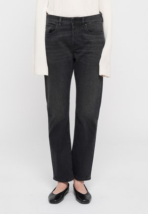 Black denim jeans with a straight cut, five pockets, and a clean design. Made from cotton with slight texture variations.
