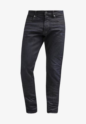 Mørkeblå denim jeans med slim fit, fem-lomme design, kontraststing og knaplukning i taljen.
