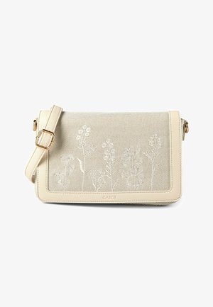 Cream crossbody bag with adjustable strap, textured floral embroidery on front flap, and gold buckle detail.
