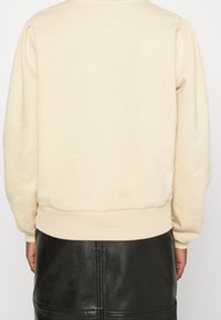 NA-KD Felpa - beige